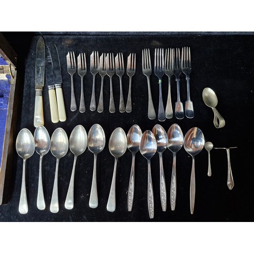 864 - A wooden canteen of silverplate cutlery including antique bone handled Harrison Fisher & Co, Sheffie... 