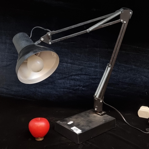 126 - An Italian made Luxo type twin II articulated table lamp in a matte black finish. Similar model $343... 