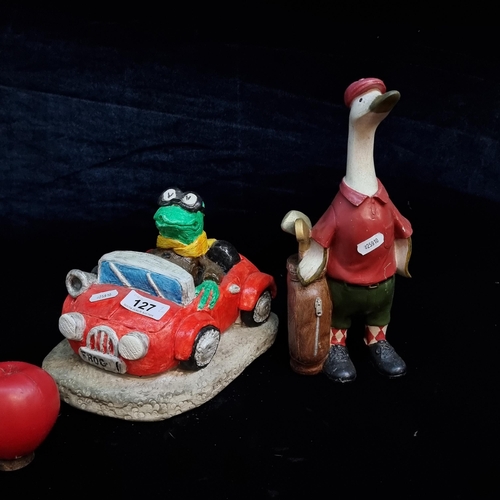 127 - Two charming garden features including a heavy cast stone frog and car, along with a goose figure go... 