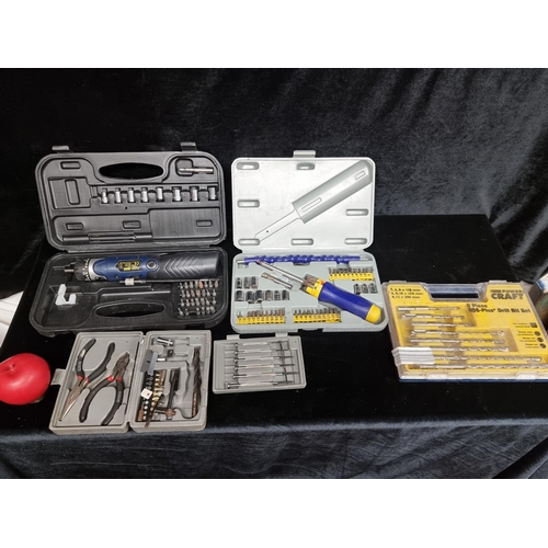 251 - Four DIY boxes of screwdriver sets and drill bits. Includes a Power Craft cordless 4.8V screwdriver.... 