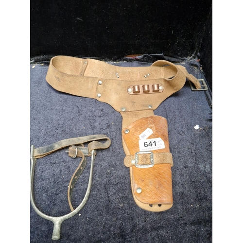 641 - Western equestrian lot includes a pair of vintage metal riding spurs with leather straps, a suede gu... 