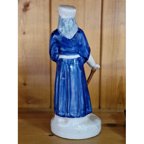 656 - A RARE 19th-century Staffordshire porcelain figurine of Shylock, hand-painted in cobalt blue with gi... 