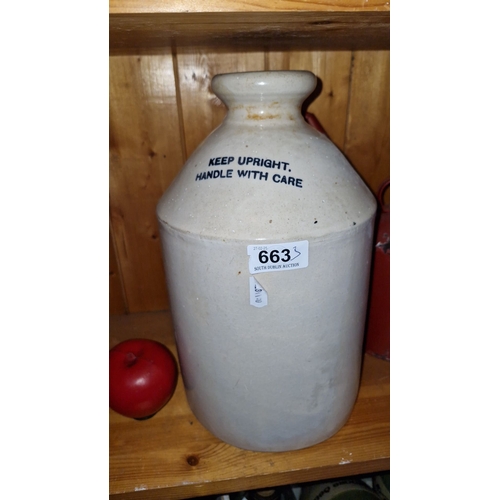 663 - Vintage stoneware storage jug with printed text, accompanied by two metal fuel oilers with red paint... 