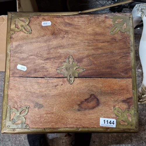 1144 - A Vintage wooden multi drawer  cabinet with brass accents, featuring multiple drawers with brass pul... 