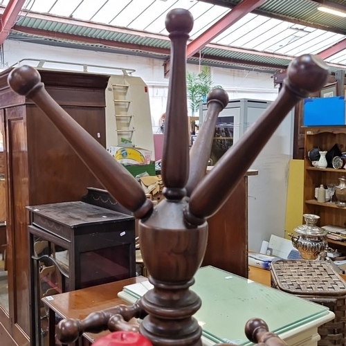 1167 - A Vintage wooden hall stand with turned column and multiple coat pegs. Features a sturdy tripod base... 