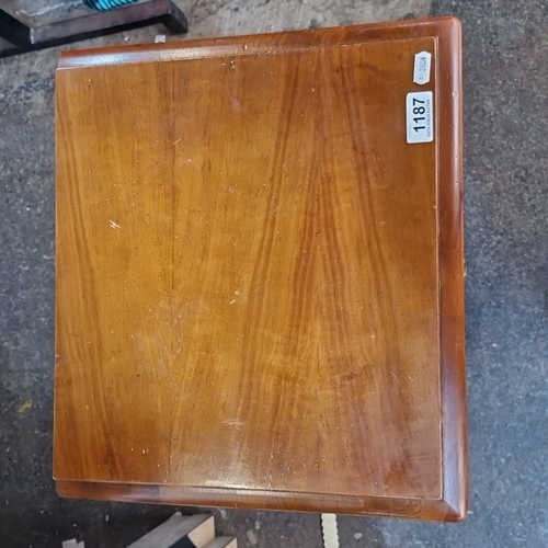 1187 - A Vintage wooden side table with carved accents, single drawer, lower shelf, decorative brass handle... 