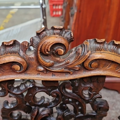 1191 - Star lot :A fabulous  antique carved wooden corner chair with intricate openwork detailing. Features... 