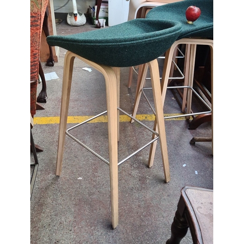 713 - Star Lot: A fabulous pair of Designville contemporary bar stools feature green upholstered seats, oa... 