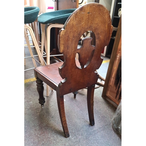 714 - Star Lot : Pair of 19th-century Victorian hall chairs, carved hardwood with pierced backrests and tu... 