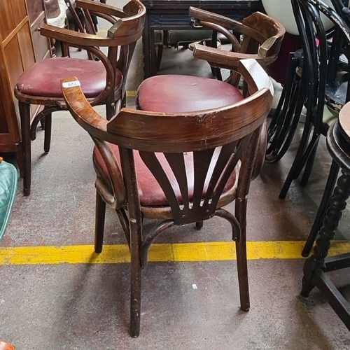 720 - Set of three vintage bentwood armchairs with curved backs and burgundy leatherette seats. Classic ca... 