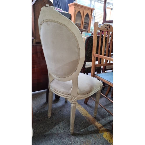 754 - A pair of Louis XVI-style carved wood fauteuil, painted cream with upholstered oval back and seat. F... 