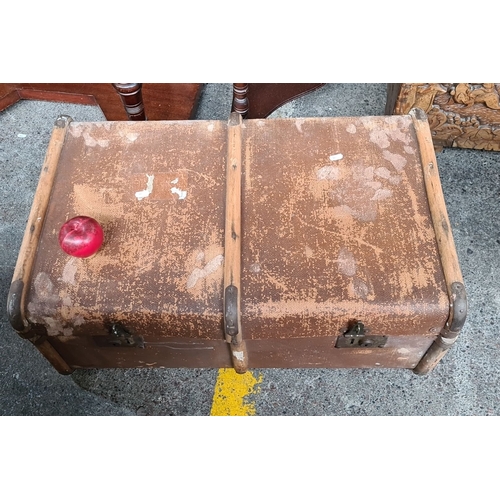 796 - Early 20th-century wooden and canvas travel trunk with metal reinforcements and leather straps.