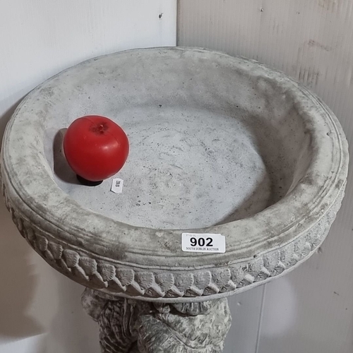 902 - Star lot :A Cast stone garden bird bath features a cherub pedestal base with intricate detailing.