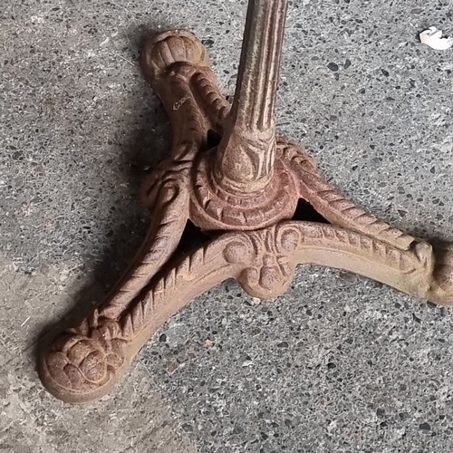 908 - An Antique cast iron bistro table with ornate tripod base and round granite top. From the late 19th ... 