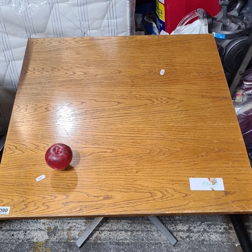 1315 - Square wooden table cafe table with a sturdy metal pedestal base.
Previous in auction on 20.02.25 wi... 