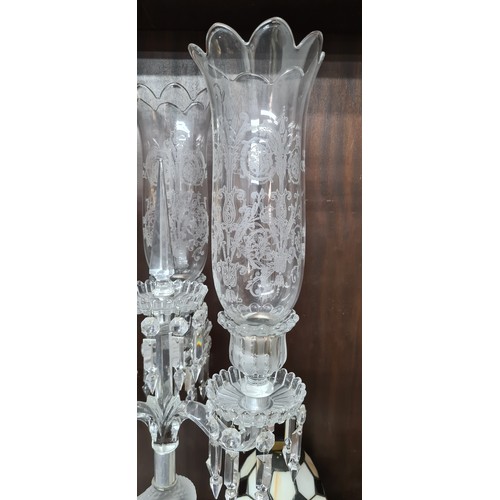 968 - Super Star Lot: An outstanding vintage  Baccarat Crystal three light Candelabra. The base is an impr... 