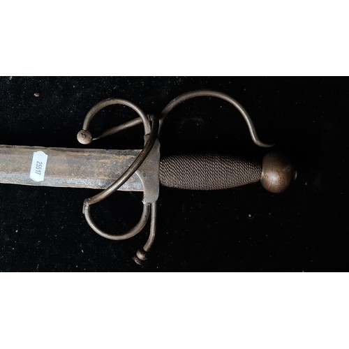 1009 - A 17th century style Toledo sword with steel frame, multi-branch guard, round shaped pommel. Wooden ... 