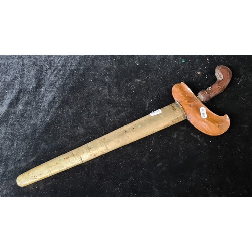 1008 - An original 19th century Indonesian Kris short sword with original scabbard.