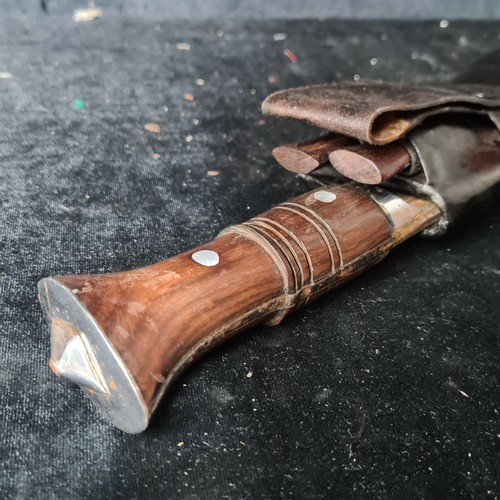 1011 - An Indian Gurkha Kukri knife with original Sheath, Two Small Knives and Pouch.