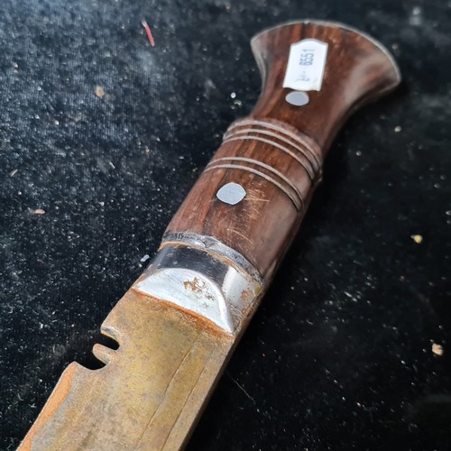 1011 - An Indian Gurkha Kukri knife with original Sheath, Two Small Knives and Pouch.