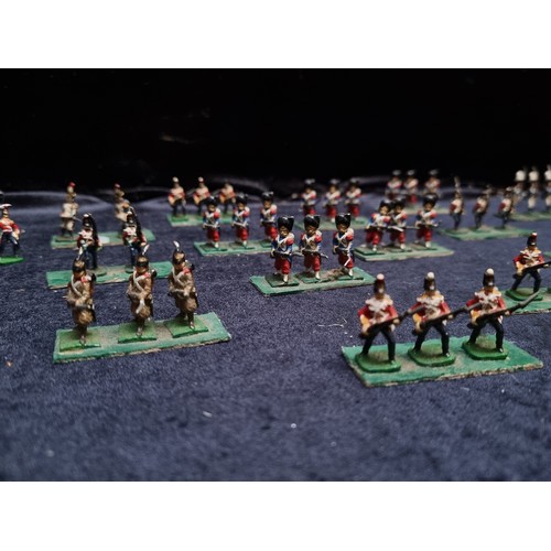 315 - A wooden box containing 22 sets of hand painted lead soldiers.