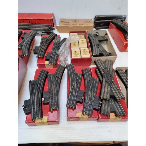 406 - A large quantity of vintage model railway track and accessories. Includes 14 boxes of Hornby series ... 