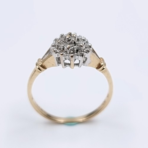 2 - Star Lot : A pretty nine carat gold diamond cluster ring. Ring size -  L. Weight - 1.66 grams.