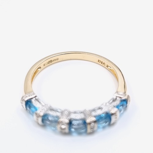 3 - Star Lot : A beautiful diamond and topaz eternity ring set in nine carat gold. Weight - 2.2 grams. S... 