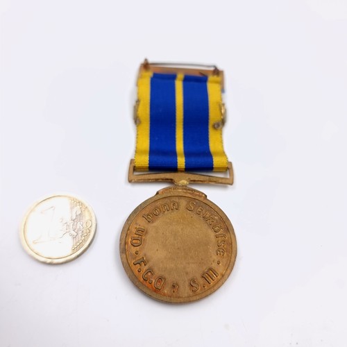 30 - An original Irish Reserve defence forces medal for 12 years service with bar and ribbon. Comes with ... 