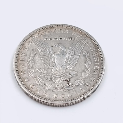 556 - A Morgan one ounce USA silver dollar coin dated 1879 Nice detail.