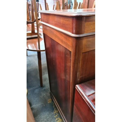 732 - Empire Style mahogany Gramophone  cabinet with brass ormolu mounts and inlaid details. Features dual... 