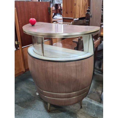 896 - Star Lot: A fantastic mid century c. 1960s formica barrel/ boat shaped cocktail bar & liquor cabinet... 