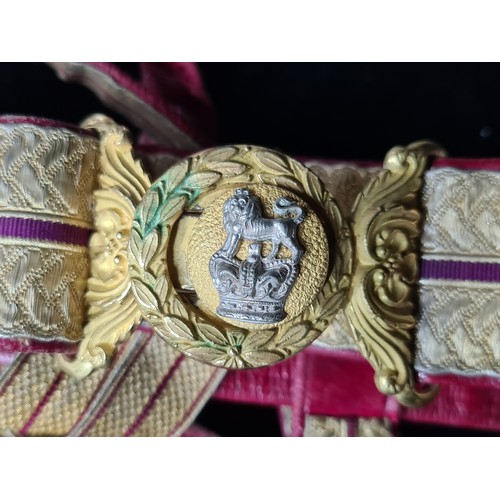 1004 - Star Lot : An early Victorian army officers sword belt With arm insignia and feather plume for the h... 