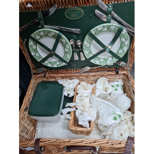 1129 - An excellent Debenhams Optima picnic basket which includes, cups, saucers, drinking glasses, cutlery... 