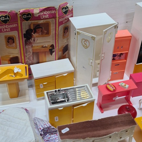 1153 - A Vintage plastic dollhouse furniture lot features mid-century style cabinets, vanities, and storage... 