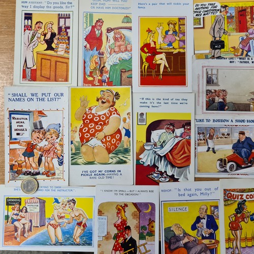 594 - A collection of over 50 vintage coloured 'Sea side' comedy postcards in good clean condition. Saucy.