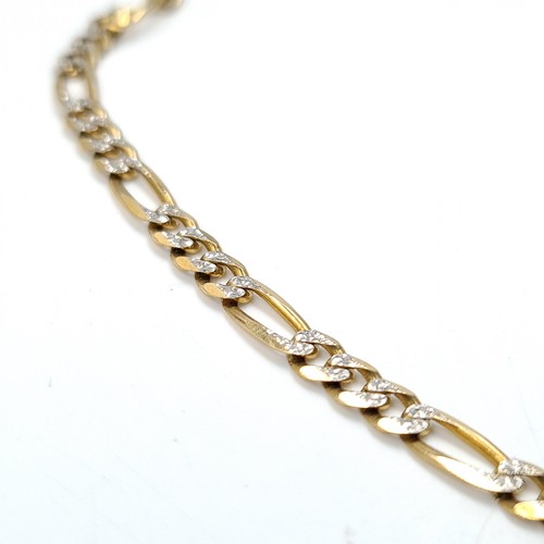 1221 - Star Lot: A very attractive Italian nine Star Lot : carat gold (375) bi-colour figaro chain necklace... 