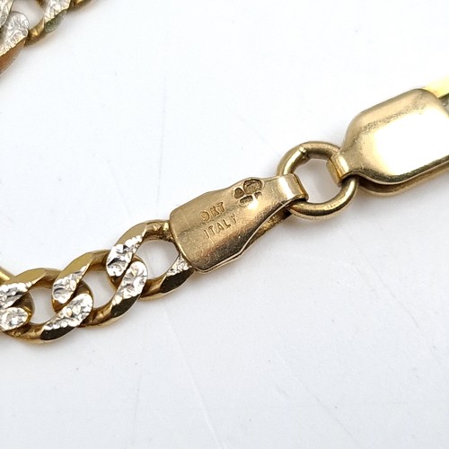 1221 - Star Lot: A very attractive Italian nine Star Lot : carat gold (375) bi-colour figaro chain necklace... 