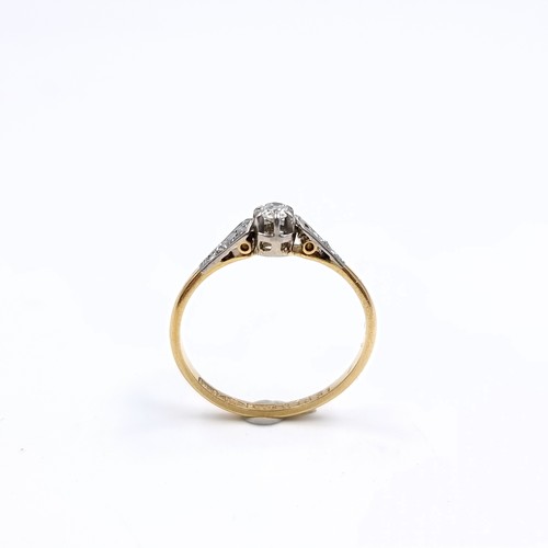 3 - An 18 carat gold ring with central diamond, estimated weight - 0.25cts. Set with diamond shoulders. ... 