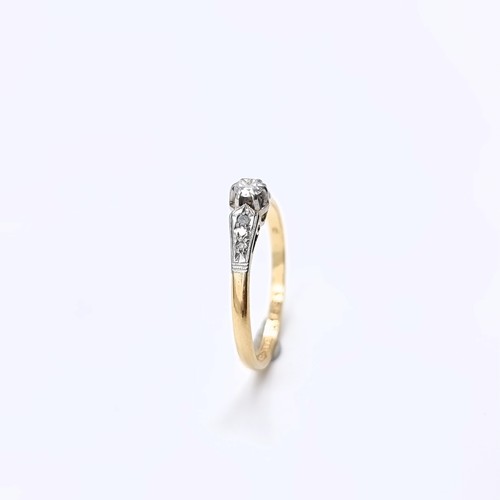 3 - An 18 carat gold ring with central diamond, estimated weight - 0.25cts. Set with diamond shoulders. ... 