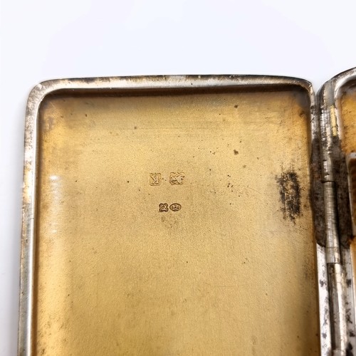 25 - An attractive unusual art deco sterling silver engine turned cigarette case with unusual gold mount ... 