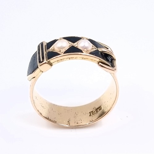 32 - Star Lot: A most attractive antique onyx and pearl set ring set in 18 carat gold stamped to band. De... 