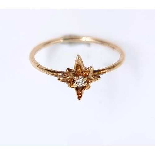 57 - Star Lot: A 14 carat gold (585) star design diamond set ring in original pink velvet ring box and du... 