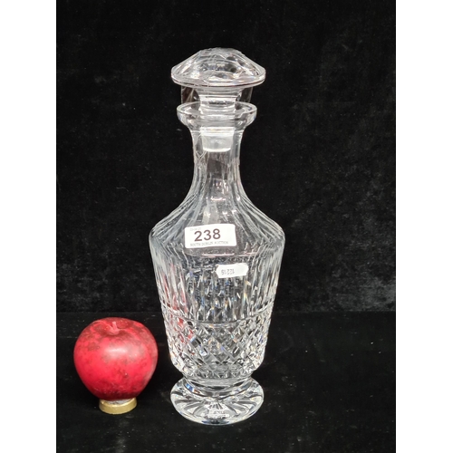 A nice tall Waterford Crystal decanter with original stopper. In very good condition with acid mark to base.