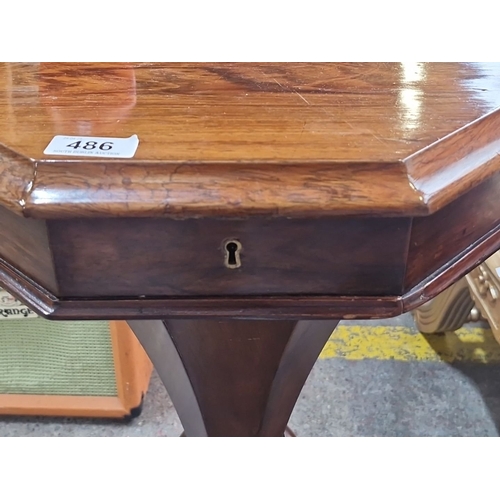 486 - Star Lot :  A super antique  Octagonal mahogany sewing poy, with flip top and beautifully carved bod... 