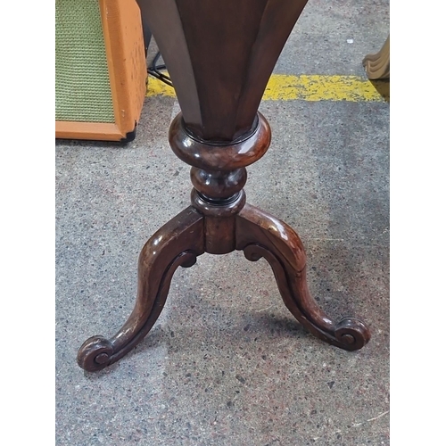 486 - Star Lot :  A super antique  Octagonal mahogany sewing poy, with flip top and beautifully carved bod... 
