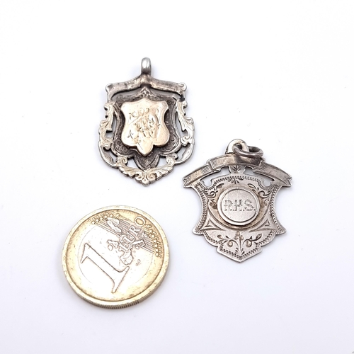 509 - Two antique sterling silver medallion pendants one featuring an inlaid gold panel hallmarked Birming... 