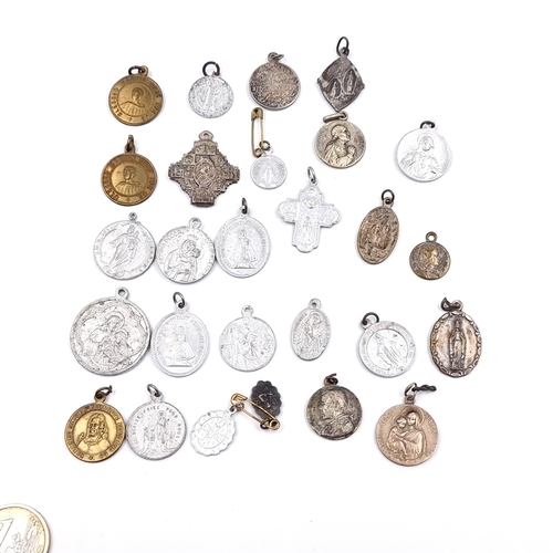 513 - A collection of religious medallions including Irish, French and Italian examples. Approx. total wei... 