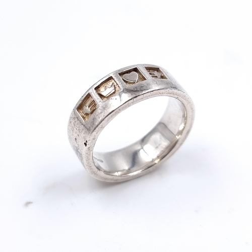 520 - Star Lot: A sterling silver Solvar stylized claddagh band ring. Size K. Weight 6.18 grams.