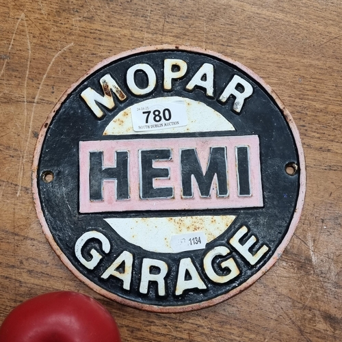 780 - A heavy cast metal circular wall plaque for Mopar Hemi Garage.